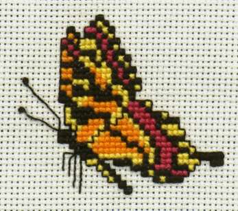 Butterfly
<p>This was one of three butterflies in a kit.&nbsp; The pieces were supposed to be placed on a ribbon, which I no longer have.</p>
Keywords: cross stitch