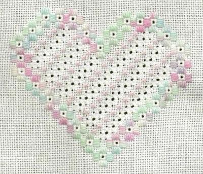 Pulled Work Heart
<p>It's not really cross stitch, but I bought it from a cross stitch store...which should count for something!&nbsp; ;D</p>
<p>Seriously, I thoroughly enjoyed making this piece.&nbsp; I haven't got the guts for Hardanger, but there was <strong>no</strong> cutting involved in this...the 