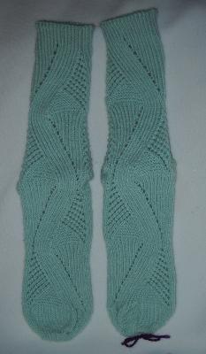 Mint Green Socks - front
<p>Aren't these <strong>amazing</strong>?! This was the first thing I saw when I opened the box, these beautiful mint green delights! I'm only sorry my camera doesn't do any of these items justice...if I didn't stand in the light, it overexposed everything, if I stood in the light, it worked, but then it rendered the colors too murky. :( This is a lovely mint green shade; here on the screen it shows more jade than mint. And look at that stitching! I'm blown away!</p>
Keywords: knitting