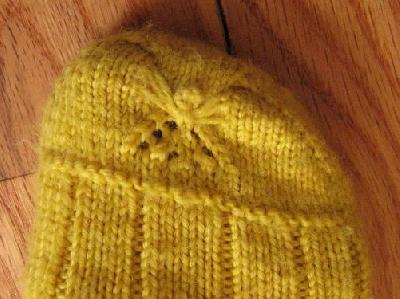 Yellow sock toe
<p>Close-up of the design I put on the toes of the Christmas socks.&nbsp; It's not my design--I found it in a book and thought it was cool.</p>
Keywords: knit