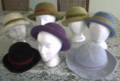 The whole group
<p>With the exception of the wide brimmed floppy hat at lower right these are all size small hats.</p>
