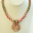 1435265996e pink sun and wind pendant kumihimo rope and fringe on bust (4).jpg